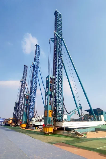 Hydraulic static pile driver operating on construction site